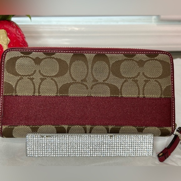 Coach Handbags - EUC Coach Signatire brown and burgundy wallet
